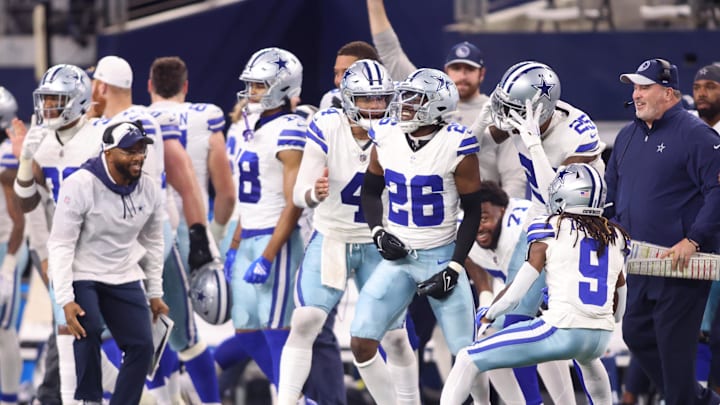 Nov 30, 2023; Arlington, Texas, USA; Dallas Cowboys cornerback DaRon Bland (26) celebrates with teammates during the second half against the Seattle Seahawks at AT&T Stadium. Mandatory Credit: Tim Heitman-Imagn Images
