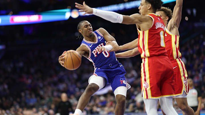 Feb 19, 2026; Philadelphia, Pennsylvania, USA; Philadelphia 76ers guard Tyrese Maxey (0) passes the ball against the Atlanta Hawks during the fourth quarter at Xfinity Mobile Arena. Mandatory Credit: Bill Streicher-Imagn Images