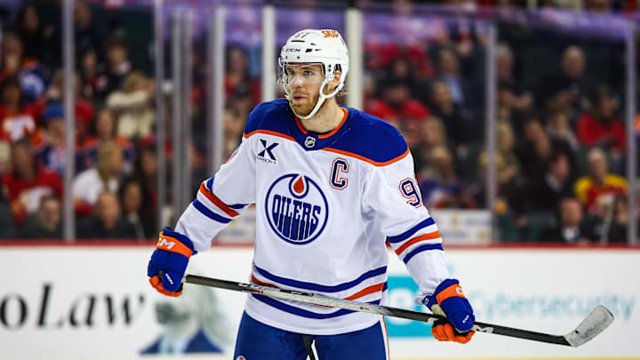 Feb 4, 2026; Calgary, Alberta, CAN; Edmonton Oilers center Connor McDavid (97) against the Calgary Flames during the third period at Scotiabank Saddledome. Mandatory Credit: Sergei Belski-Imagn Images