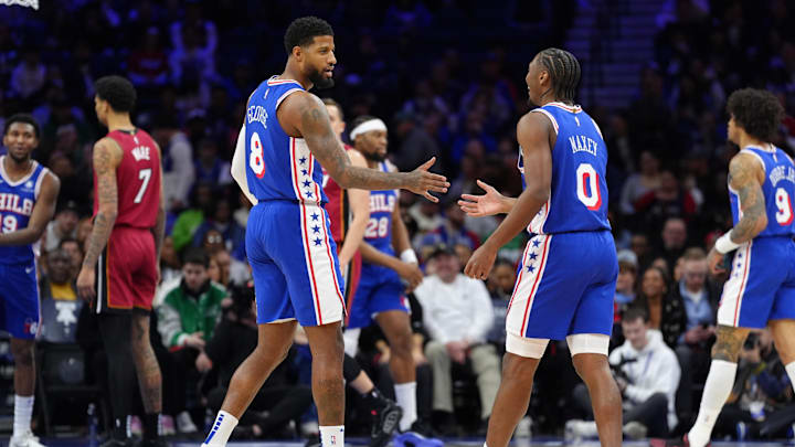 Feb 5, 2025; Philadelphia, Pennsylvania, USA; Philadelphia 76ers forward Paul George (8) reacts with guard Tyrese Maxey (0) against the Miami Heat in the first quarter at Wells Fargo Center. Mandatory Credit: Kyle Ross-Imagn Images Feb 5, 2025; Philadelphia, Pennsylvania, USA; Philadelphia 76ers forward Paul George (8) reacts with guard Tyrese Maxey (0) against the Miami Heat in the first quarter at Wells Fargo Center. Mandatory Credit: Kyle Ross-Imagn Images