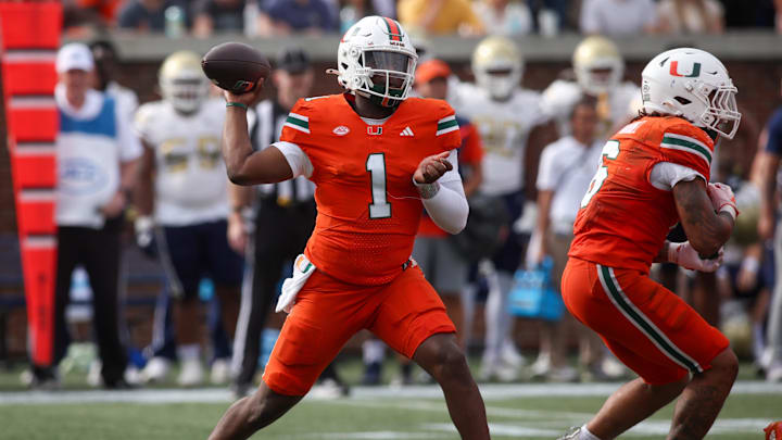Nov 9, 2024; Atlanta, Georgia, USA; Miami Hurricanes quarterback Cam Ward (1) throws a pass against the Georgia Tech Yellow Jackets in the third quarter at Bobby Dodd Stadium at Hyundai Field. Mandatory Credit: Brett Davis-Imagn Images