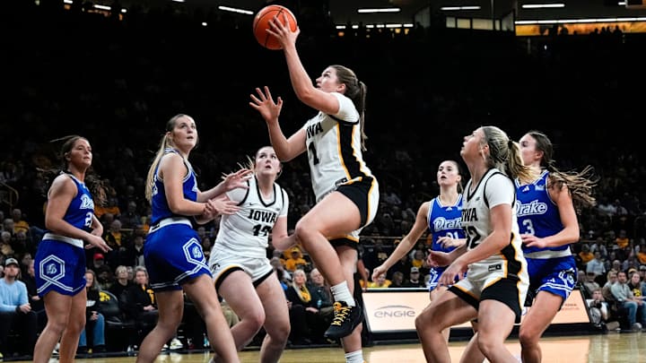 Iowa guard Taylor Stremlow (1) drives to the basket against the Drake Bulldogs Nov. 13, 2025 at Carver-Hawkeye Arena in Iowa City, Iowa.