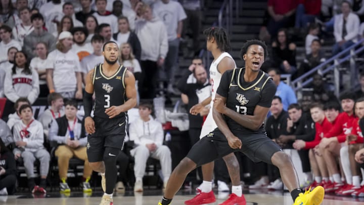 Jan 27, 2024; Cincinnati, Ohio, USA; UCF Knights forward Marchelus Avery (13) reacts to making a