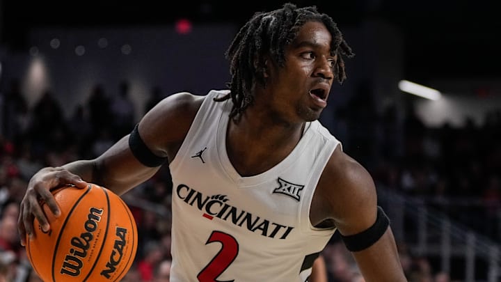 Cincinnati Bearcats guard Jizzle James drives during game against the Northern Kentucky Norse