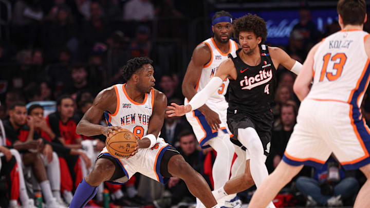 Mar 30, 2025; New York, New York, USA; New York Knicks forward OG Anunoby (8) is guarded by Portland Trail Blazers guard Matisse Thybulle (4) during the first half at Madison Square Garden. Mandatory Credit: Vincent Carchietta-Imagn Images