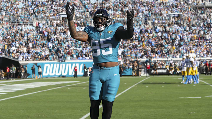Nov 16, 2025; Jacksonville, Florida, USA; Jacksonville Jaguars defensive end BJ Green II (95) celebrates an interception by teammate against the Los Angeles Chargers during the fourth quarter at EverBank Stadium. Mandatory Credit: Morgan Tencza-Imagn Images