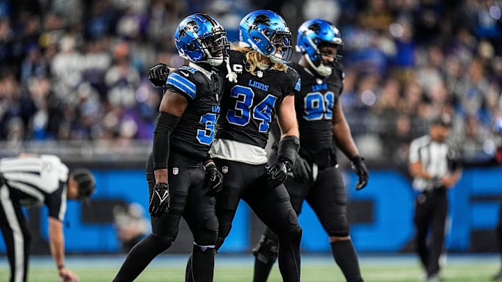 From left, Detroit Lions safety Kerby Joseph (31), linebacker Alex Anzalone (34), and defensive end Levi Onwuzurike (91) walk off the field after a play against Minnesota Vikings during the second half at Ford Field in Detroit on Sunday, Jan. 5, 2025. From left, Detroit Lions safety Kerby Joseph (31), linebacker Alex Anzalone (34), and defensive end Levi Onwuzurike (91) walk off the field after a play against Minnesota Vikings during the second half at Ford Field in Detroit on Sunday, Jan. 5, 2025.