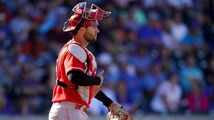 Cincinnati Reds catcher Chris Okey (72) sends signs to the team during a spring training game against the Chicago Cubs, Monday, March 21, 2022, at Sloan Park in Mesa, Ariz.
Cincinnati Reds At Chicago Cubs March 21 0328 Cincinnati Reds catcher Chris Okey (72) sends signs to the team during a spring training game against the Chicago Cubs, Monday, March 21, 2022, at Sloan Park in Mesa, Ariz.
Cincinnati Reds At Chicago Cubs March 21 0328