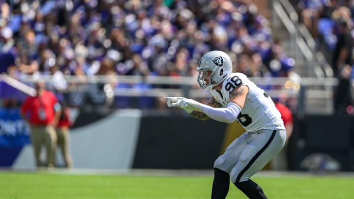 Sep 15, 2024; Baltimore, Maryland, USA; Las Vegas Raiders defensive end Maxx Crosby (98) celebrates after a sack during the first half against the Baltimore Ravens at M&T Bank Stadium. Mandatory Credit: Reggie Hildred-Imagn Images Sep 15, 2024; Baltimore, Maryland, USA; Las Vegas Raiders defensive end Maxx Crosby (98) celebrates after a sack during the first half against the Baltimore Ravens at M&T Bank Stadium. Mandatory Credit: Reggie Hildred-Imagn Images