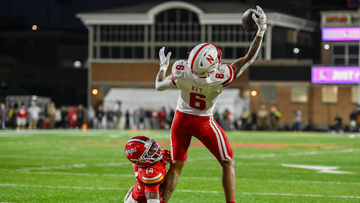 Oct 11, 2025; College Park, Maryland, USA; Nebraska Cornhuskers wide receiver wide receiver Dane Key (6) catches the eventual game winning touchdown over Maryland Terrapins defensive back Jamare Glasker (14) during the fourth quarter at SECU Stadium. Oct 11, 2025; College Park, Maryland, USA; Nebraska Cornhuskers wide receiver wide receiver Dane Key (6) catches the eventual game winning touchdown over Maryland Terrapins defensive back Jamare Glasker (14) during the fourth quarter at SECU Stadium.