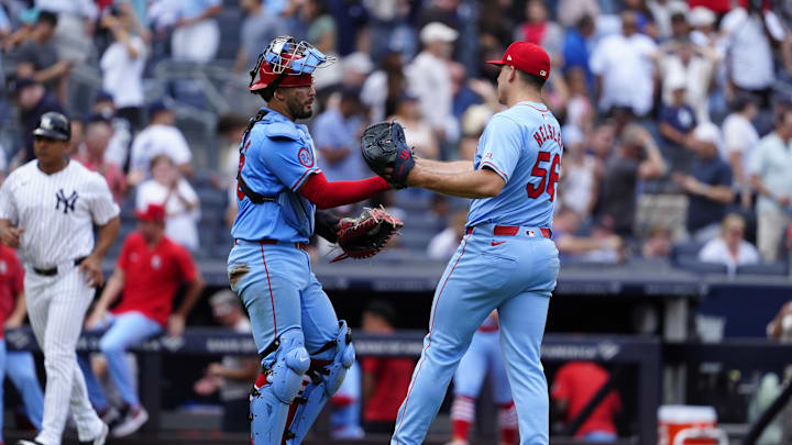 St. Louis Cardinals catcher Ivan Herrera (48) and St. Louis Cardinals pitcher Ryan Helsley (56) shake hands to celebrate the victory against the New York Yankees after the ninth inning at Yankee Stadium in 2024. St. Louis Cardinals catcher Ivan Herrera (48) and St. Louis Cardinals pitcher Ryan Helsley (56) shake hands to celebrate the victory against the New York Yankees after the ninth inning at Yankee Stadium in 2024.