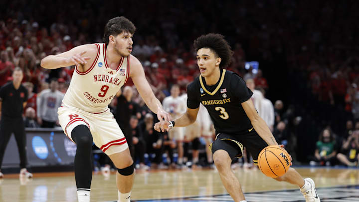 Mar 21, 2026; Oklahoma City, OK, USA; Vanderbilt Commodores guard Tyler Tanner (3) drives to the hoop past Nebraska Cornhuskers forward Berke Buyuktuncel (9) during the second half of a second round game of the men's 2026 NCAA Tournament at Paycom Center. Mandatory Credit: Alonzo Adams-Imagn Images Mar 21, 2026; Oklahoma City, OK, USA; Vanderbilt Commodores guard Tyler Tanner (3) drives to the hoop past Nebraska Cornhuskers forward Berke Buyuktuncel (9) during the second half of a second round game of the men's 2026 NCAA Tournament at Paycom Center. Mandatory Credit: Alonzo Adams-Imagn Images