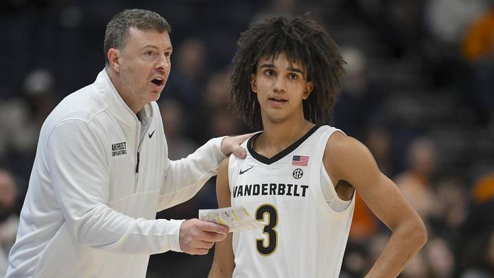 Mar 13, 2026; Nashville, TN, USA; Vanderbilt Commodores head coach Mark Byington talks with guard Tyler Tanner (3) during a break in action against the Tennessee Volunteers during the second half at Bridgestone Arena. Mandatory Credit: Steve Roberts-Imagn Images Mar 13, 2026; Nashville, TN, USA; Vanderbilt Commodores head coach Mark Byington talks with guard Tyler Tanner (3) during a break in action against the Tennessee Volunteers during the second half at Bridgestone Arena. Mandatory Credit: Steve Roberts-Imagn Images