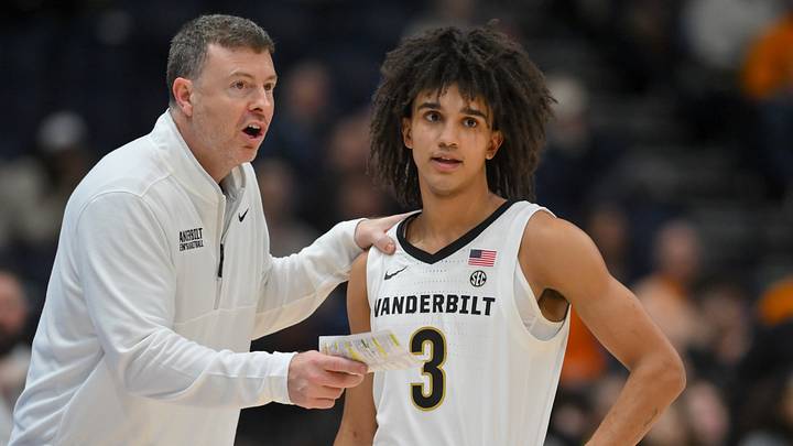 Mar 13, 2026; Nashville, TN, USA; Vanderbilt Commodores head coach Mark Byington talks with guard Tyler Tanner (3) during a break in action against the Tennessee Volunteers during the second half at Bridgestone Arena. Mandatory Credit: Steve Roberts-Imagn Images Mar 13, 2026; Nashville, TN, USA; Vanderbilt Commodores head coach Mark Byington talks with guard Tyler Tanner (3) during a break in action against the Tennessee Volunteers during the second half at Bridgestone Arena. Mandatory Credit: Steve Roberts-Imagn Images