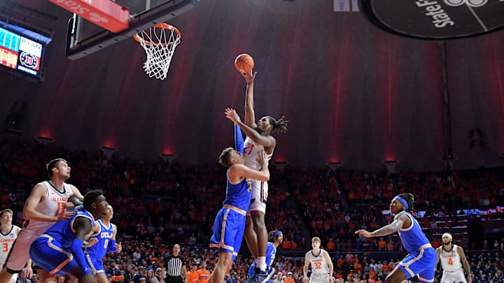 Feb 11, 2025; Champaign, Illinois, USA; Illinois Fighting Illini forward Morez Johnson Jr. (21) shoots the ball during the second half against the UCLA Bruins at State Farm Center. Mandatory Credit: Ron Johnson-Imagn Images Feb 11, 2025; Champaign, Illinois, USA; Illinois Fighting Illini forward Morez Johnson Jr. (21) shoots the ball during the second half against the UCLA Bruins at State Farm Center. Mandatory Credit: Ron Johnson-Imagn Images