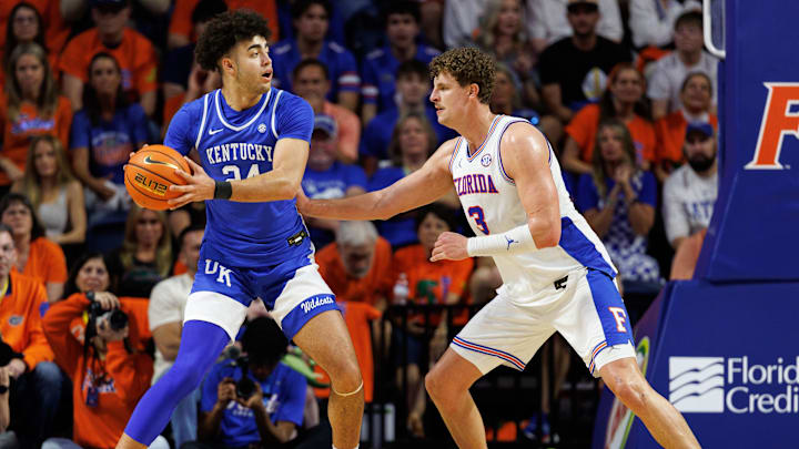 Feb 14, 2026; Gainesville, Florida, USA; Kentucky Wildcats center Malachi Moreno (24) posts up against Florida Gators center Micah Handlogten (3) during the second half at Exactech Arena at the Stephen C. O'Connell Center. Mandatory Credit: Matt Pendleton-Imagn Images Feb 14, 2026; Gainesville, Florida, USA; Kentucky Wildcats center Malachi Moreno (24) posts up against Florida Gators center Micah Handlogten (3) during the second half at Exactech Arena at the Stephen C. O'Connell Center. Mandatory Credit: Matt Pendleton-Imagn Images