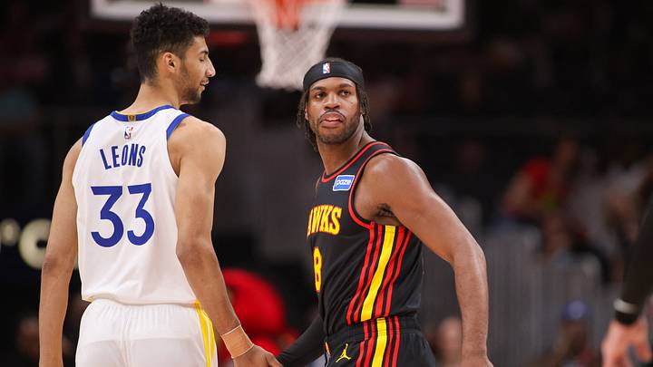 Mar 21, 2026; Atlanta, Georgia, USA; Atlanta Hawks guard Buddy Hield (8) talks to Golden State Warriors forward Malevy Leons (33) in the fourth quarter at State Farm Arena. Mandatory Credit: Brett Davis-Imagn Images Mar 21, 2026; Atlanta, Georgia, USA; Atlanta Hawks guard Buddy Hield (8) talks to Golden State Warriors forward Malevy Leons (33) in the fourth quarter at State Farm Arena. Mandatory Credit: Brett Davis-Imagn Images