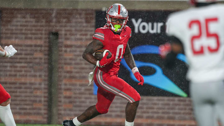 Baylor's David Gabriel Georges (0) carries the ball in the end zone for a touchdown during the Division II-AAA championship game at Finley Stadium in Chattanooga, Tenn., on Dec. 4, 2025.
