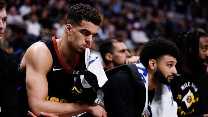 May 6, 2024; Denver, Colorado, USA; Denver Nuggets forward Michael Porter Jr. (1) and guard Jamal Murray (27) on the bench in the fourth quarter against the Minnesota Timberwolves during game two of the second round for the 2024 NBA playoffs at Ball Arena. Mandatory Credit: Isaiah J. Downing-Imagn Images