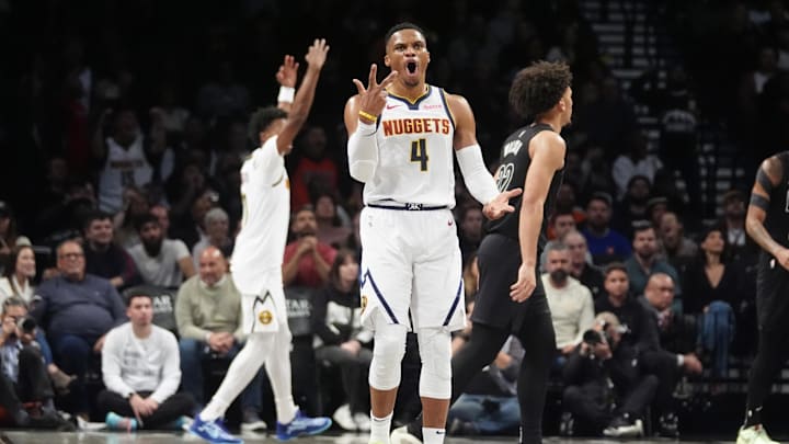 Denver Nuggets point guard Russell Westbrook (4) reacts to making a three point jump shot against the Brooklyn Nets during the second half at Barclays Center. Mandatory Credit: Gregory Fisher-Imagn Images