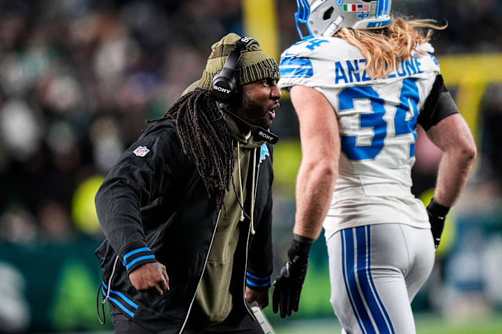 Football coach yells to player during game Football coach yells to player during game