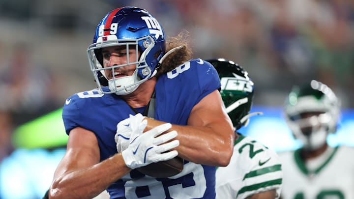 New York Giants tight end Greg Dulcich (89) catches a touchdown pass during the second half against the New York Jets at MetLife Stadium. New York Giants tight end Greg Dulcich (89) catches a touchdown pass during the second half against the New York Jets at MetLife Stadium.