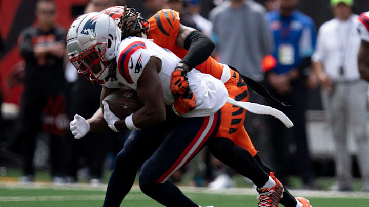 New England Patriots wide receiver K.J. Osborn (2) is tackled by Cincinnati Bengals cornerback Cam Taylor-Britt (29) in the second quarter of the NFL game at Paycor Stadium in Cincinnati on Sunday, Sept. 8, 2024.