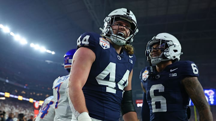 Penn State Nittany Lions tight end Tyler Warren (44) reacts with wide receiver Harrison Wallace III (6) after scoring a touchdown against the Boise State Broncos. Penn State Nittany Lions tight end Tyler Warren (44) reacts with wide receiver Harrison Wallace III (6) after scoring a touchdown against the Boise State Broncos.
