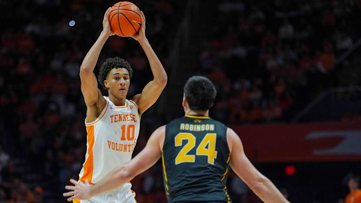 Tennessee forward Nate Ament (10) looks for a teammate to pass the ball to in front of Northern Kentucky forward Kael Robinson (24) during a NCAA basketball game between the Tennessee Volunteers and Northern Kentucky Norse at Thompson-Boling Arena at Food City Center on Nov. 8, 2025.