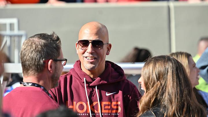 Nov 22, 2025; Blacksburg, Virginia, USA; Incoming head coach James Franklin speaks to fans on the sideline before the game at Lane Stadium. Mandatory Credit: Brian Bishop-Imagn Images