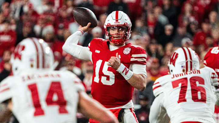 Nov 23, 2024; Lincoln, Nebraska, USA; Nebraska Cornhuskers quarterback Dylan Raiola (15) passes against the Wisconsin Badgers defense during the fourth quarter at Memorial Stadium. Nov 23, 2024; Lincoln, Nebraska, USA; Nebraska Cornhuskers quarterback Dylan Raiola (15) passes against the Wisconsin Badgers defense during the fourth quarter at Memorial Stadium.