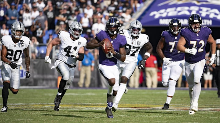 Baltimore Ravens quarterback Lamar Jackson (8) runs during the second half against the Las Vegas Raiders at M&T Bank Stadium. Baltimore Ravens quarterback Lamar Jackson (8) runs during the second half against the Las Vegas Raiders at M&T Bank Stadium.