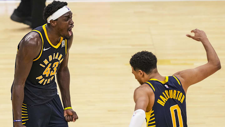 Oct 30, 2024; Indianapolis, Indiana, USA; Indiana Pacers forward Pascal Siakam (43) and guard Tyrese Haliburton (0) celebrate Siakam’s game-winning three point basket against the Boston Celtics at Gainbridge Fieldhouse. Mandatory Credit: Grace Smith-Imagn Images