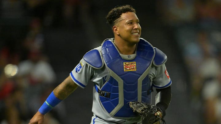 Sep 23, 2025; Anaheim, California, USA;  Kansas City Royals catcher Salvador Perez (13) smiles after catching a pop foul during the third inning against the Los Angeles Angels at Angel Stadium. Mandatory Credit: Jayne Kamin-Oncea-Imagn Images