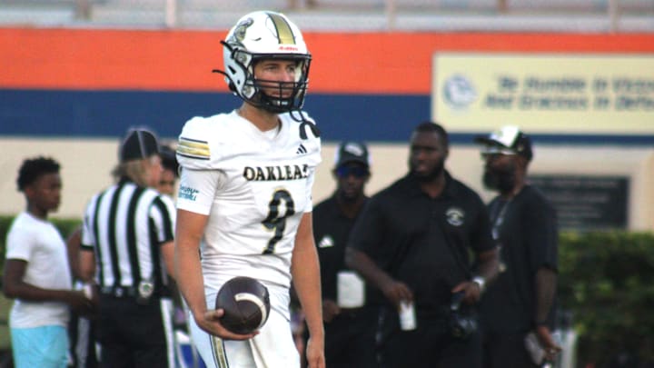 Oakleaf quarterback Jack McKissock (9) prepares to pass in warm-ups before a high school football game at Bolles on September 20, 2024. [Clayton Freeman/Florida Times-Union]