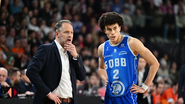 [US, Mexico & Canada customers only] Feb 15, 2025 Caen, FRANCE; St Quentin point guard Nolan Traore with coach Julien Mahe against Le Mans in a Leaders Cup match. Mandatory Credit: Franck Faugere/Presse Sports via Imagn Images