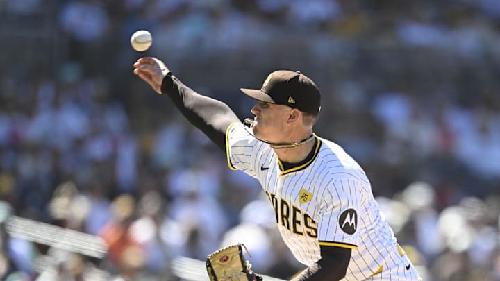 August 14, 2024; San Diego, California, USA; San Diego Padres pitcher Sean Reynolds (25) delivers against the Pittsburgh Pirates during the eighth inning at Petco Park. Mandatory Credit: Denis Poroy-Imagn Images at Petco Park. 