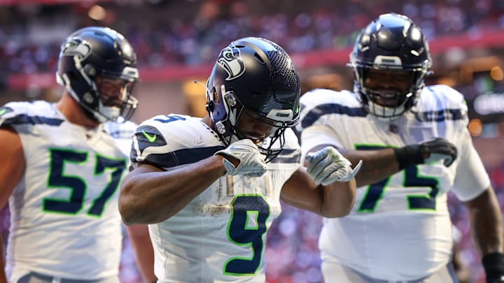 Oct 20, 2024; Atlanta, Georgia, USA; Seattle Seahawks running back Kenneth Walker III (9) celebrates after a touchdown catch against the Atlanta Falcons in the third quarter at Mercedes-Benz Stadium. Mandatory Credit: Brett Davis-Imagn Images
