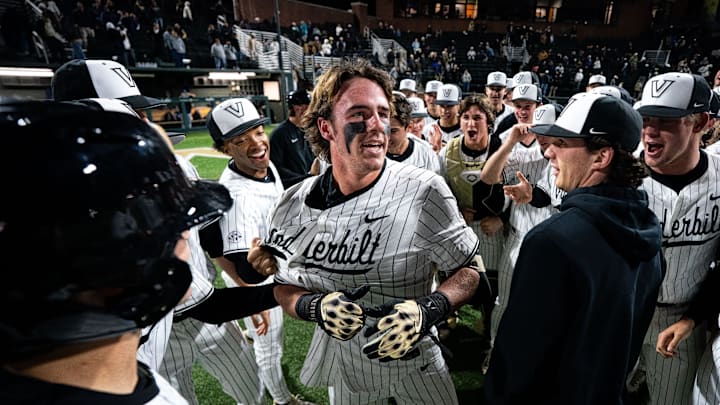 Vanderbilt third baseman Brodie Johnston (9) celebrates his walk-off grand slam against Xavier during the seventh inning at Hawkins Field in Nashville, Tenn., Friday, March 7, 2025. Vanderbilt won 15-3.