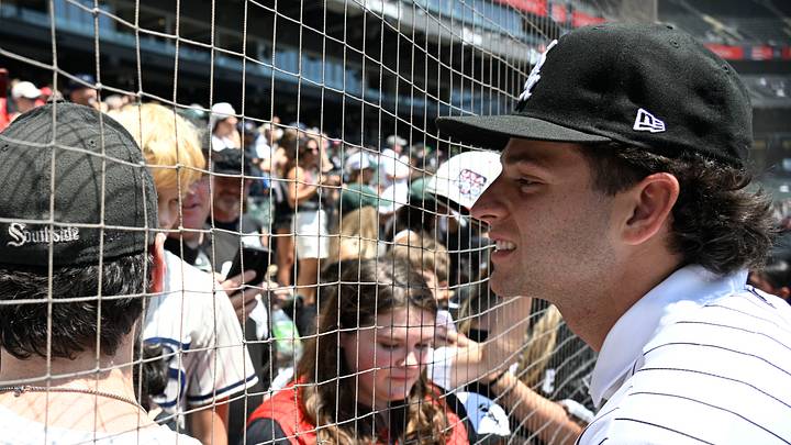 Jul 12, 2026; Chicago, Illinois, USA;  Chicago White Sox number one draft pick Roch Cholowsky signs autographs before the team’s game against the Athletics at Rate Field. Mandatory Credit: Matt Marton-Imagn Images
