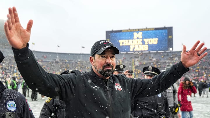 Ohio State head coach Ryan Day waves at fans to celebrate 27-9 win over Michigan at Michigan Stadium in Ann Arbor on Saturday, Nov. 29, 2025. Ohio State head coach Ryan Day waves at fans to celebrate 27-9 win over Michigan at Michigan Stadium in Ann Arbor on Saturday, Nov. 29, 2025.