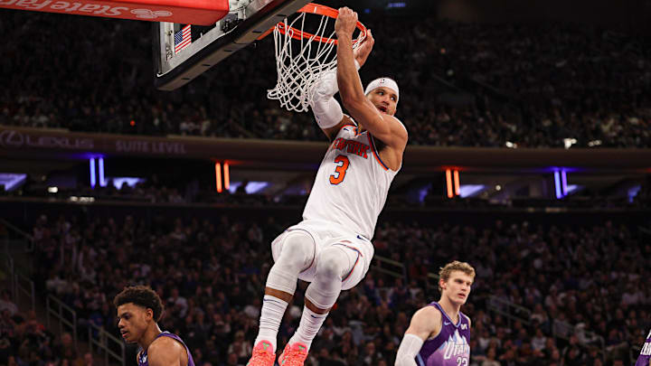 Jan 1, 2025; New York, New York, USA; New York Knicks guard Josh Hart (3) hangs on the rim after a dunk against the Utah Jazz during the second half at Madison Square Garden. Mandatory Credit: Vincent Carchietta-Imagn Images Jan 1, 2025; New York, New York, USA; New York Knicks guard Josh Hart (3) hangs on the rim after a dunk against the Utah Jazz during the second half at Madison Square Garden. Mandatory Credit: Vincent Carchietta-Imagn Images