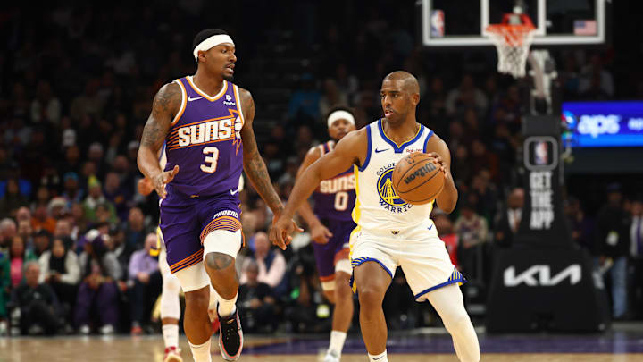 Dec 12, 2023; Phoenix, Arizona, USA; Golden State Warriors guard Chris Paul (right) against Phoenix Suns guard Bradley Beal at Footprint Center. Mandatory Credit: Mark J. Rebilas-Imagn Images Dec 12, 2023; Phoenix, Arizona, USA; Golden State Warriors guard Chris Paul (right) against Phoenix Suns guard Bradley Beal at Footprint Center. Mandatory Credit: Mark J. Rebilas-Imagn Images