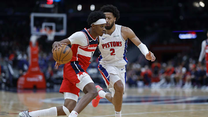 Nov 17, 2024; Washington, District of Columbia, USA; Washington Wizards guard Bilal Coulibaly (0) drives to the basket as Detroit Pistons guard Cade Cunningham (2) defends in the second half at Capital One Arena. Mandatory Credit: Geoff Burke-Imagn Images