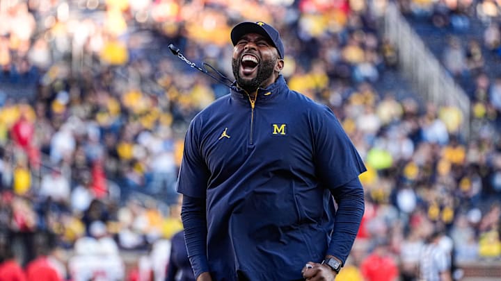 Michigan head coach Sherrone Moore fires up the student section during warm up ahead of the New Mexico game at Michigan Stadium in Ann Arbor on Saturday, August 30, 2025.