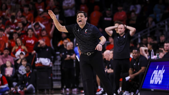 Mar 5, 2025; Cincinnati, Ohio, USA; Cincinnati Bearcats head coach Wes Miller yells to his team in the second half against the Kansas State Wildcats at Fifth Third Arena. Mandatory Credit: Katie Stratman-Imagn Images Mar 5, 2025; Cincinnati, Ohio, USA; Cincinnati Bearcats head coach Wes Miller yells to his team in the second half against the Kansas State Wildcats at Fifth Third Arena. Mandatory Credit: Katie Stratman-Imagn Images