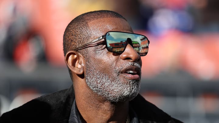 Dec 21, 2025; Cleveland, Ohio, USA;  Legendary  football and baseball player and father of Cleveland Browns quarterback Shedeur Sanders, Deion Sanders on the sidelines prior to a game against the Buffalo Bills at Huntington Bank Field. Mandatory Credit: Scott Galvin-Imagn Images