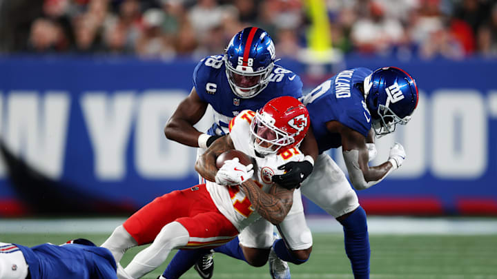 Sep 21, 2025; East Rutherford, New Jersey, USA; New York Giants inside linebacker Bobby Okereke (58) and safety Jevon Holland (8) and cornerback Paulson Adebo (21) tackle Kansas City Chiefs wide receiver Nikko Remigio (81) in the second quarter at MetLife Stadium. Sep 21, 2025; East Rutherford, New Jersey, USA; New York Giants inside linebacker Bobby Okereke (58) and safety Jevon Holland (8) and cornerback Paulson Adebo (21) tackle Kansas City Chiefs wide receiver Nikko Remigio (81) in the second quarter at MetLife Stadium.