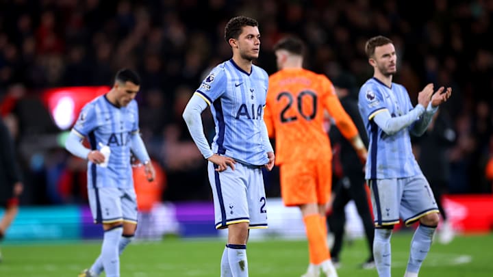 Spurs players acknowledge the travelling fans after the game 