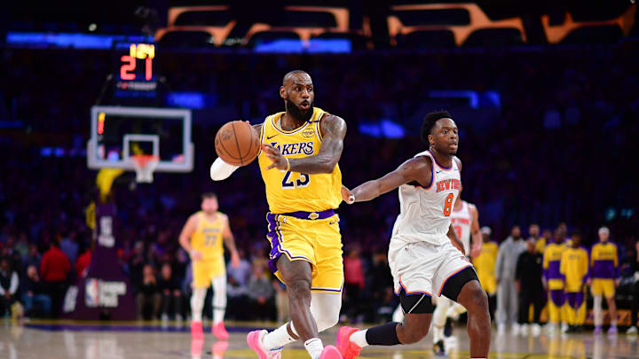 Mar 6, 2025; Los Angeles, California, USA; Los Angeles Lakers forward LeBron James (23) passes the ball ahead of New York Knicks forward OG Anunoby (8) during the second half at Crypto.com Arena. Mandatory Credit: Gary A. Vasquez-Imagn Images Mar 6, 2025; Los Angeles, California, USA; Los Angeles Lakers forward LeBron James (23) passes the ball ahead of New York Knicks forward OG Anunoby (8) during the second half at Crypto.com Arena. Mandatory Credit: Gary A. Vasquez-Imagn Images